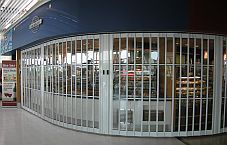 A folding shutter with glass panels.